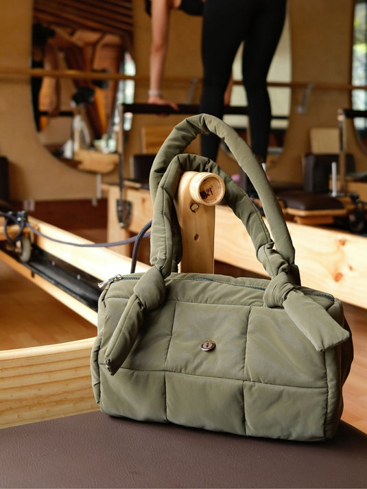 Bolso deportivo acolchado oliva - vista lateral - Ellora